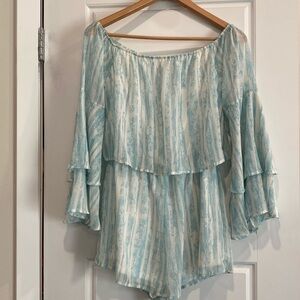 Pink lily size S. Blue and white romper